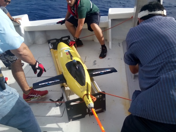 A team of scientists from AOML and the University of Puerto Rico bring one of the gliders aboard the R/V La Sultana.