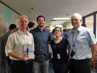 Dr. Atlas (left) celebrates 9 years as the AOML director with AOML scientists. Image credit: NOAA