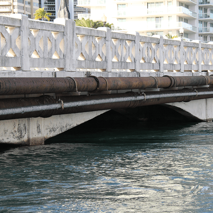 King Tide: tide at 8:30am marks a before with low watermark on a bridge in Coconut Grove