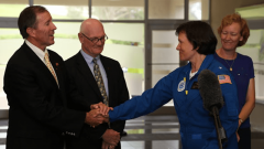 Rear Admiral Anita Lopez shakes hands with Bermuda Premier Michael Dunkley. Image credit: NOAA
