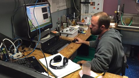 Analysis goes on 24 hours. Andrew Stefanick on the night shift. Image credit: NOAA