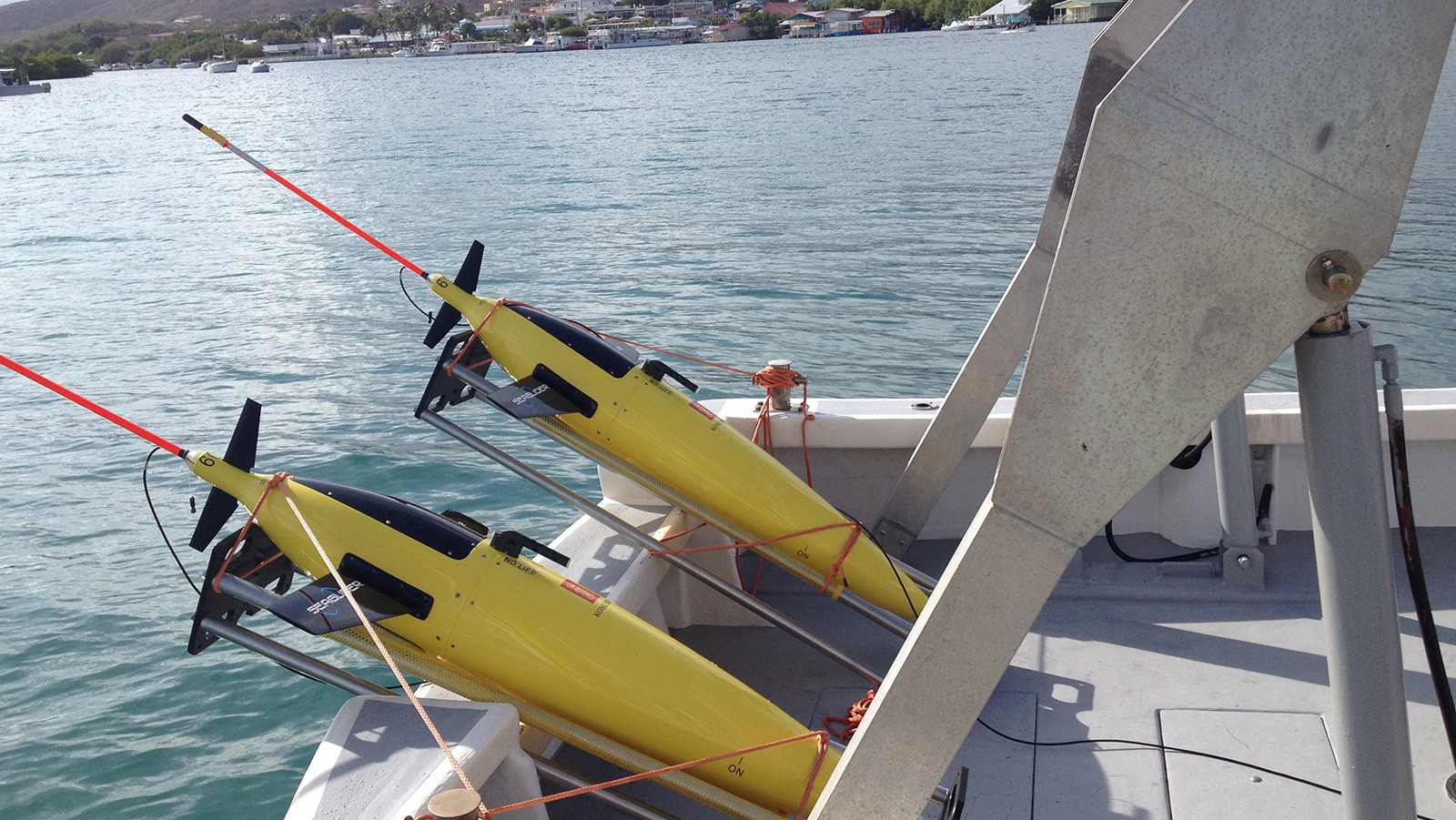 Two underwater gliders are ready for deployment from the R/V La Sultana, off the coast of Puerto Rico. Image credit: NOAA