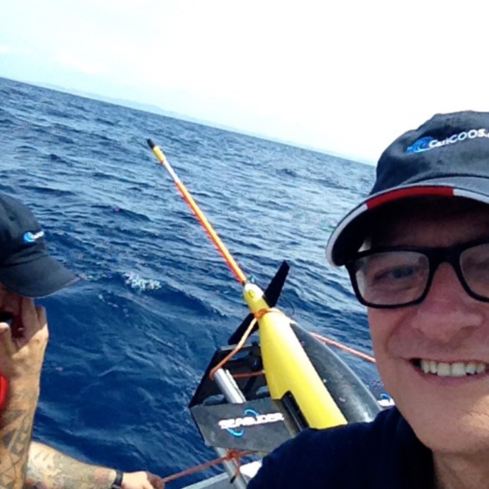 AOML's Principal Investigator, Dr. Gustavo Goni, takes a selfie with the glider before deployment. Image credit: NOAA