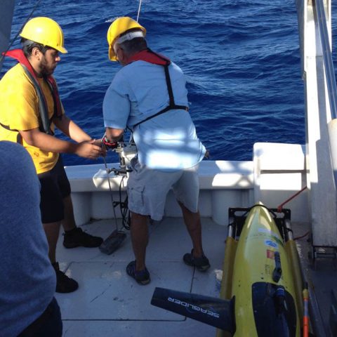 The glider is secured after being brought aboard the R/V La Sultana. Image credit: NOAA