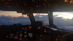 Cockpit of the flying lab during sunrise, tropical storm Hermine. Photo Credit NOAA AOML.