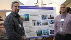 Ulises Rivero and Pedro Peña at poster session during 2019 lab review. Photo Credit: NOAA AOML. Uli Riverio and Pedro Peña at poster session during 2019 lab review. Photo Credit: NOAA AOML.