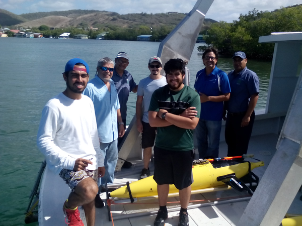 Participants  of the recovery activities aboard the R/V La Sultana from the University of Puerto Rico. From left to right: Erick Garcia, Professor Julio Morel, Hugo Montalvo, Ricardo Domingues, Luis Pomales, La Sultana’s captain Cesar Carrero, and Wilson Ramos. Missing on the picture is Mr. Ubaldo Lopez.