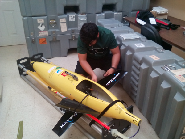 Mr. Luis Pomales disassembling the gliders