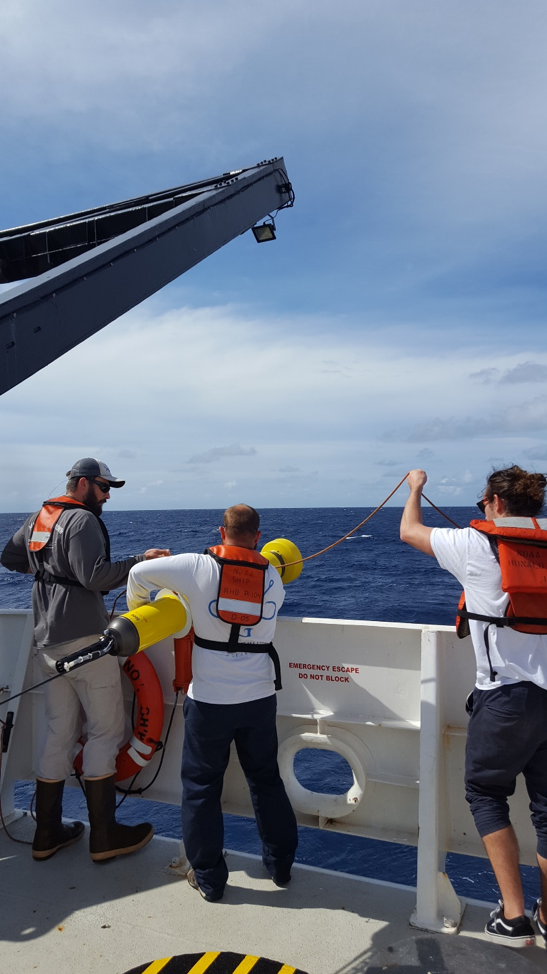 From left to right, Ian, Andy, and Christian deploying an ARGO float