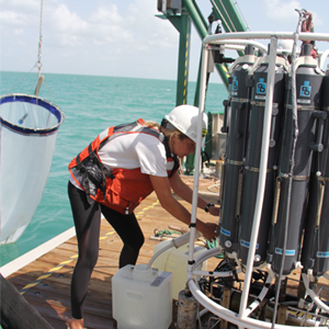 Kelly taking water samples