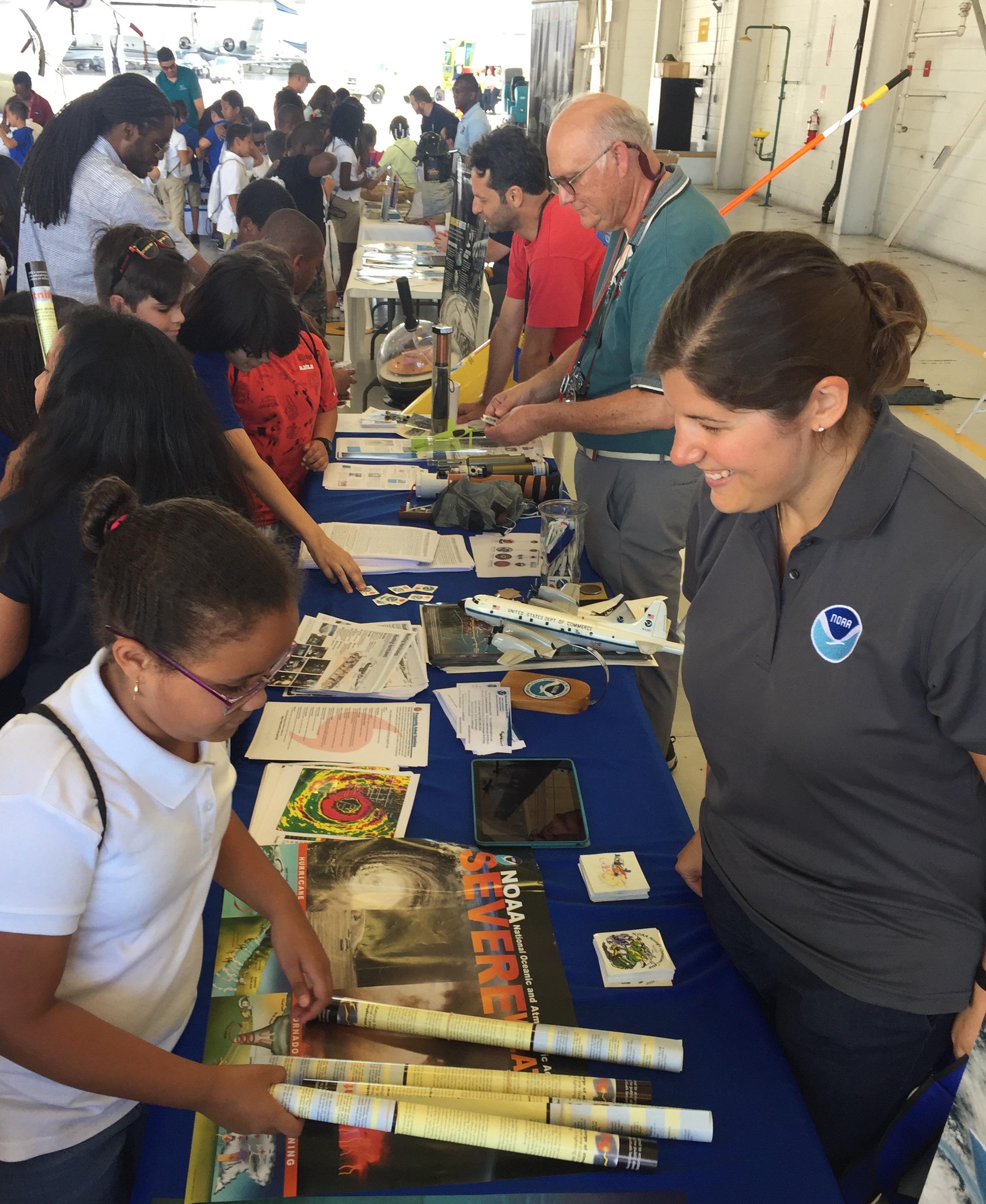 AOML Scientists teaching visitors about hurricane data collection. Image credit: NOAA