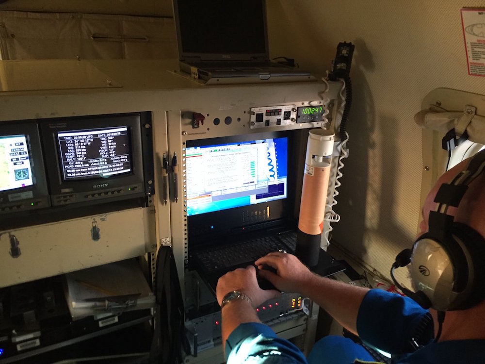 NOAA AOC tech preparing to launch a dropsonde into TD9. Image credit: NOAA