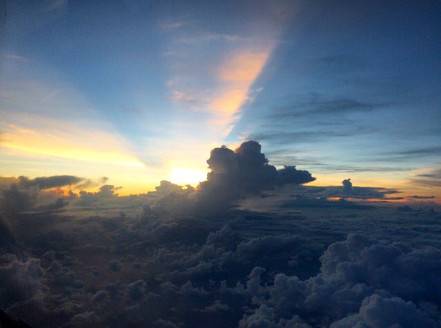 View of TD9 from the plane as the sun peaks out behind it. Image credit: NOAA