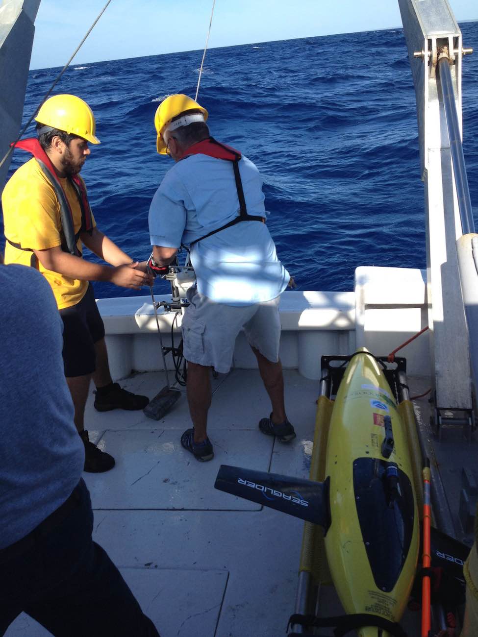 The glider is secured after being brought aboard the R/V La Sultana. Image credit: NOAA