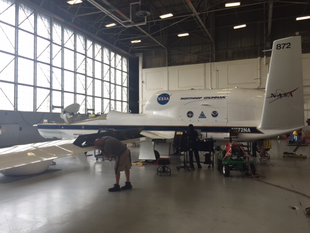 NASA's Global Hawk is inspected inside its hangar between flights into Tropical Storm Fred. Image credit: NOAA