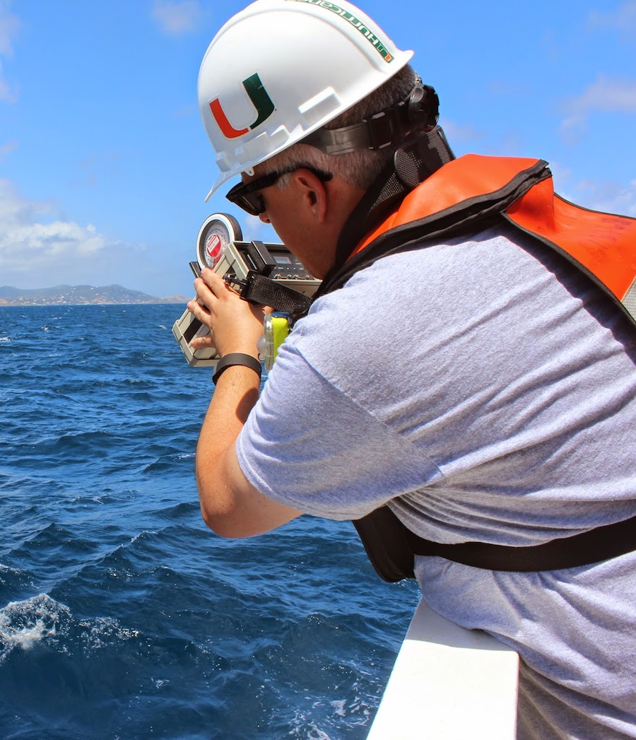 Dan Otis of the University of South Florida measures remote-sensing reflectance with a spectro-radiometer, which measures individual wavelengths of light. Image credit: NOAA