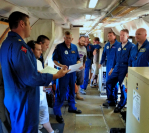 Pre-launch schedule and safety briefing on the P3 Hurricane Hunter aircraft. Image credit: NOAA 
