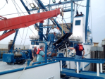 Preparing to deploy the wave gliders. Image credit: NOAA