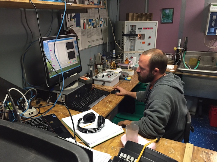 Analysis goes on 24 hours. Andrew Stefanick on the night shift. Image credit: NOAA 