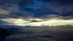 Sobre las nubes puesta de sol de la tormenta tropical Erika en 2015. Crédito de la foto, NOAA AOML.