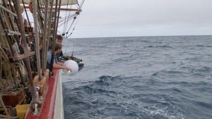 A drifting buoy being deployed from the Bark Europa off South Africa (credit: NOAA/AOML).