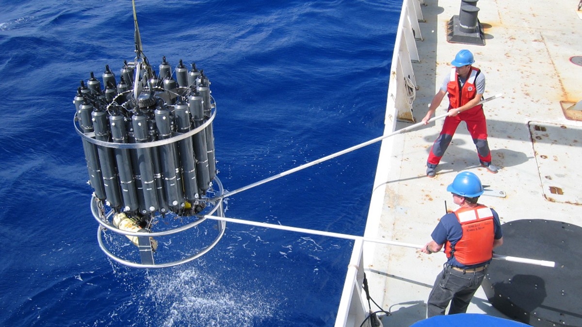 Scientists lift a CTD rosette on board to collect ocean carbon samples. image credit: Nicolas Gruber, ETH, Switzerland