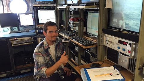 Miguel Figurrola Hernaez running the CTD console on the midnight to noon shift. Image credit: NOAA