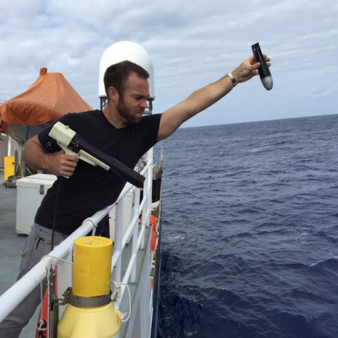 Jay Hooper conducting an XBT fall rate test. Image credit: NOAA