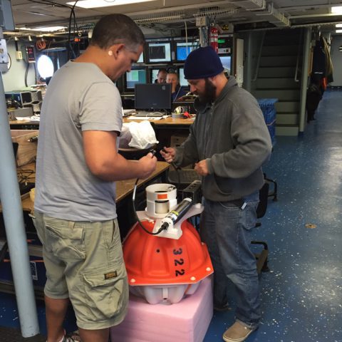 Preparing an inverted echo sounder for deployment. Image credit: NOAA