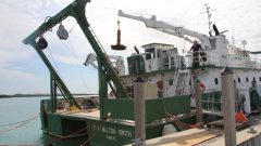 PhOD personnel load equipment onto the R/V F.G. Walton Smith in preparation for their hydrographic survey in the Florida Straits. Image Credit: NOAA