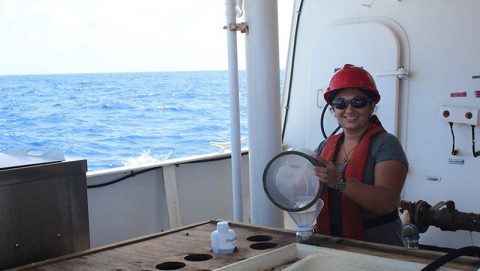 Alexis Sabine sorts through the contents of the S10 net. Image credit: NOAA