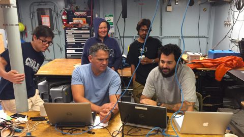 AOML and University of Puerto Rico scientists reviewing the latest ocean observations from the WBTS cruise. Image credit: NOAA