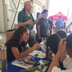 AOML Scientists teaching visitors about hurricane data collection. Image credit: NOAA