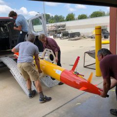 Loading the eAUV for launch. Photo Credit: NOAA.