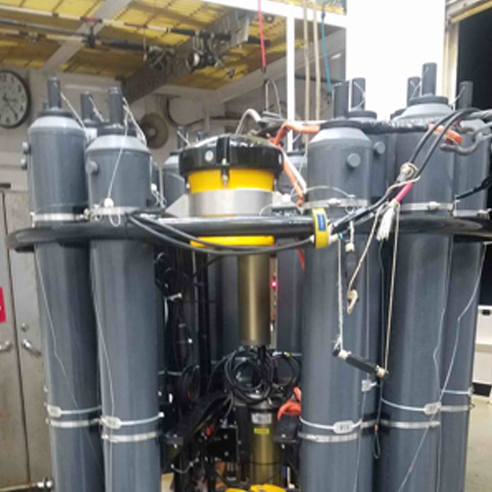 A full view of instruments attached to the platform. The LADCPs are the yellow instruments and the battery pack is the large cylinder sitting in front of the downlooker LADCP. Photo Credit: NOAA.