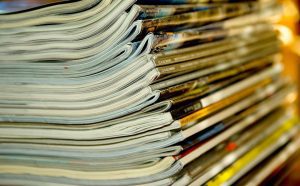 The side view of a stack of journals.