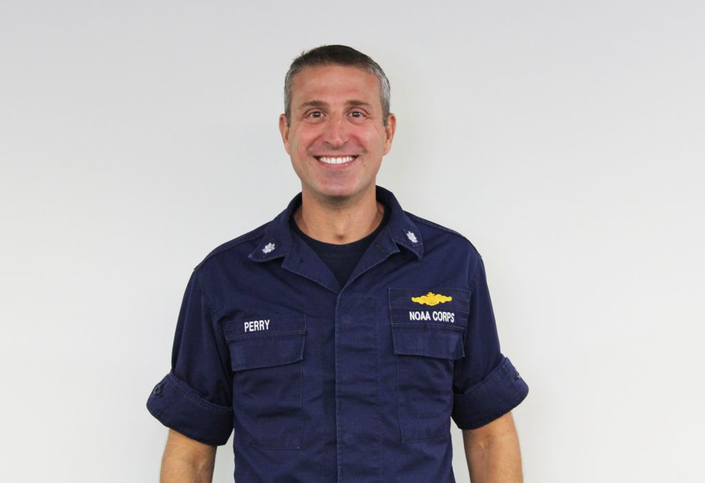 Color photograph of Associate Director Tony Parry in dark blue NOAA Corps uniform.