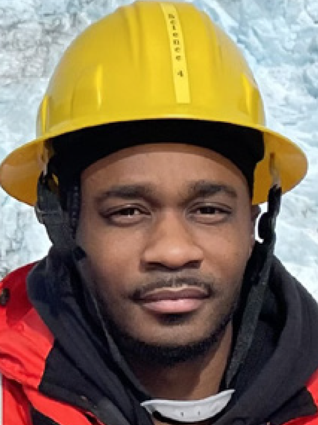 Color Portrait of Daryin Medley in Protective gear for deck work (hard hat, foul weather gear, pfd)